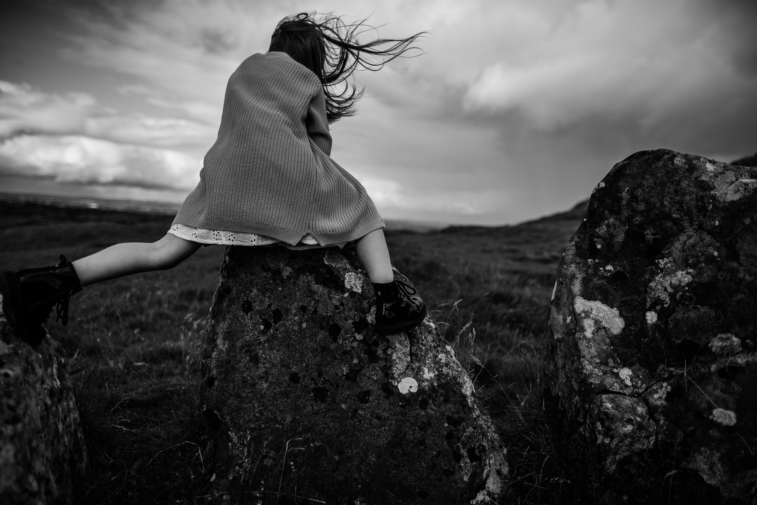 Girl climbing the rock