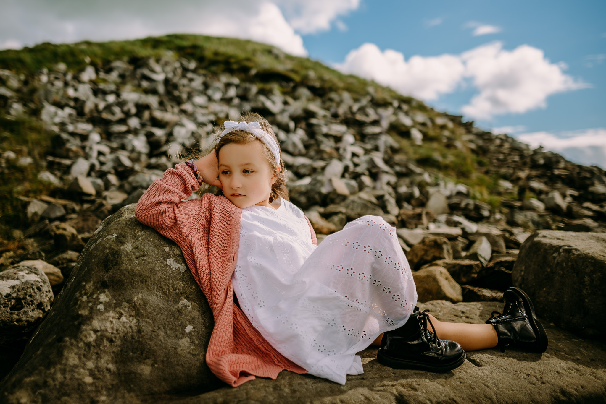 Girl relaxing on the rock