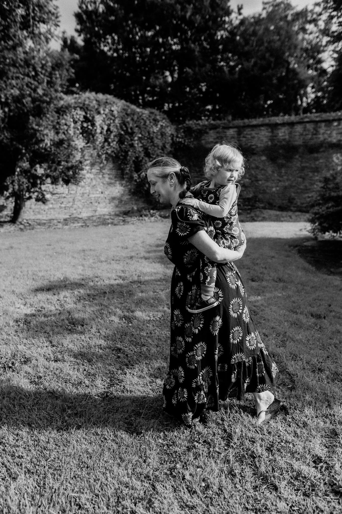 mother-carrying-her-son-playing-Rockfield-House-Kells-kristina-kelly-photography