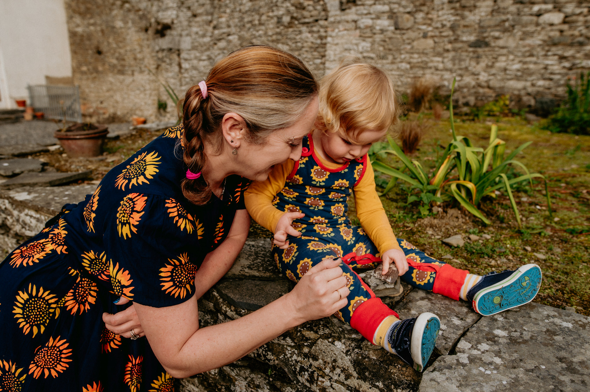mother-and-son-playing-with-rocks-Rockfield-House-Kells-kristina-kelly-photography